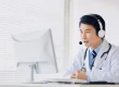 Doctor conducting a telemedicine consultation using a computer