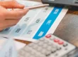 Finance professional reviewing AR and interest rate report
