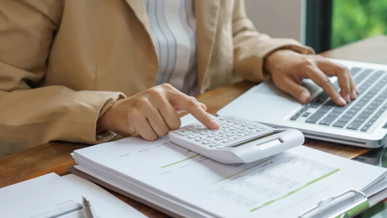 UK business owner managing HMRC tax accounts on laptop