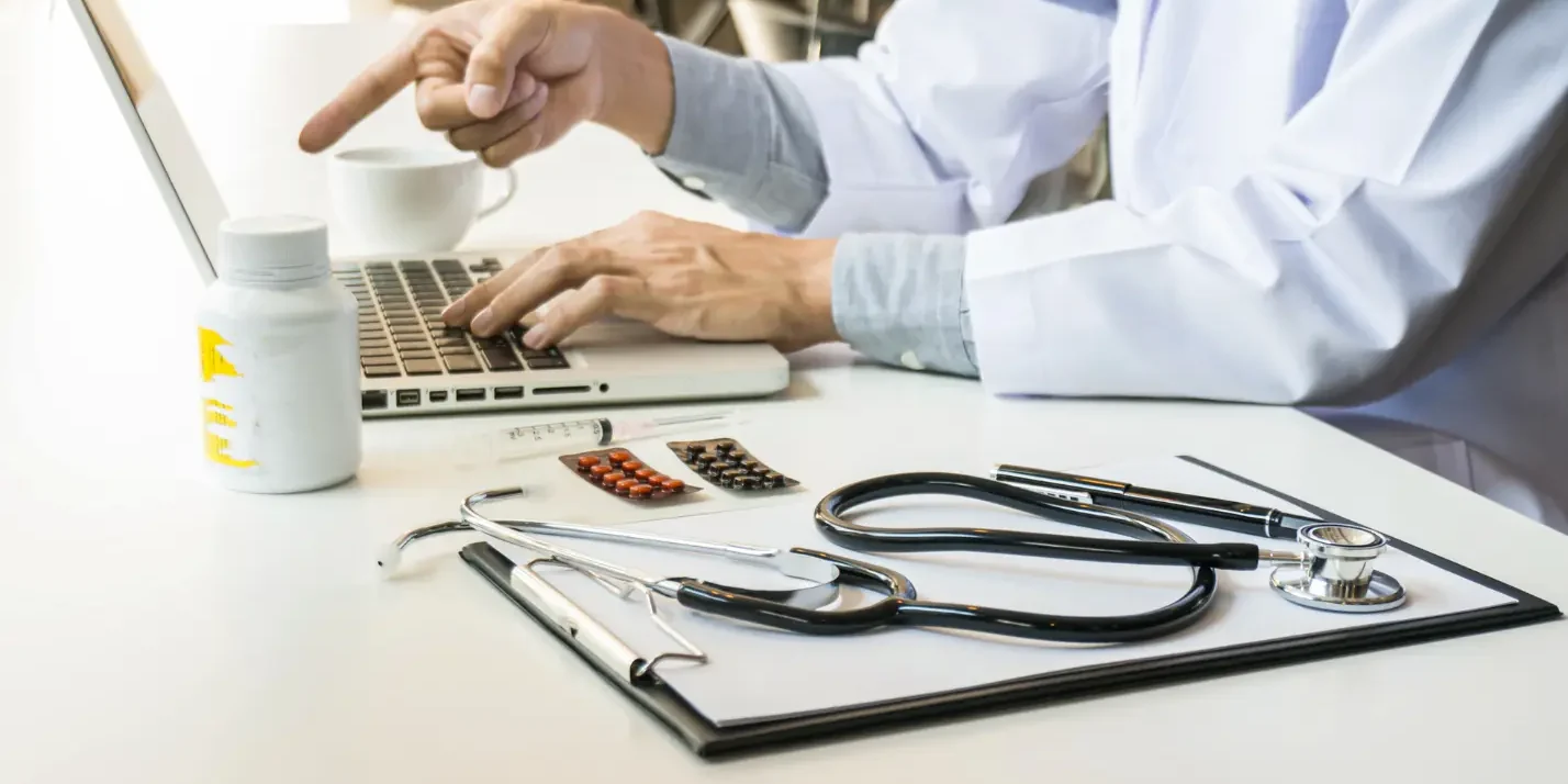 Doctor working on prior authorizartion