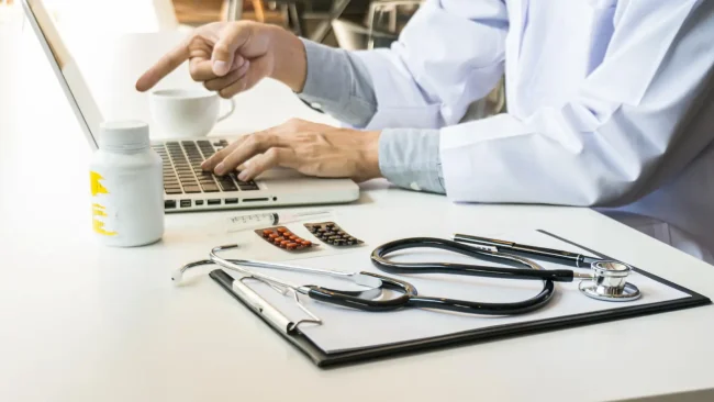 Prior authorization Doctor working on prior authorizartion
